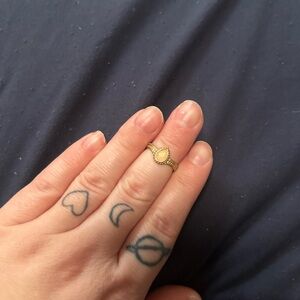 Elegant Gold Ring with Orange Gemstone